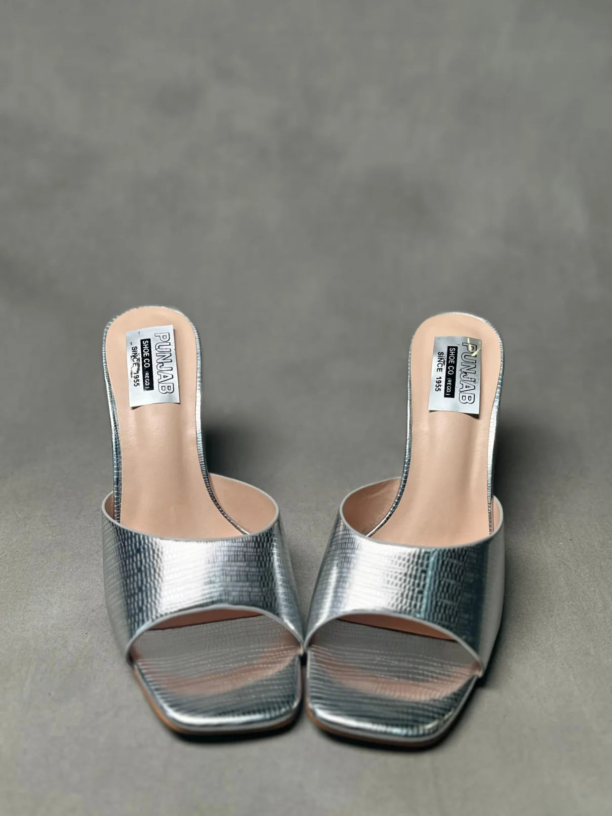Front View of Stylish Silver Snakeskin High Heel Mules with Open Toe Design