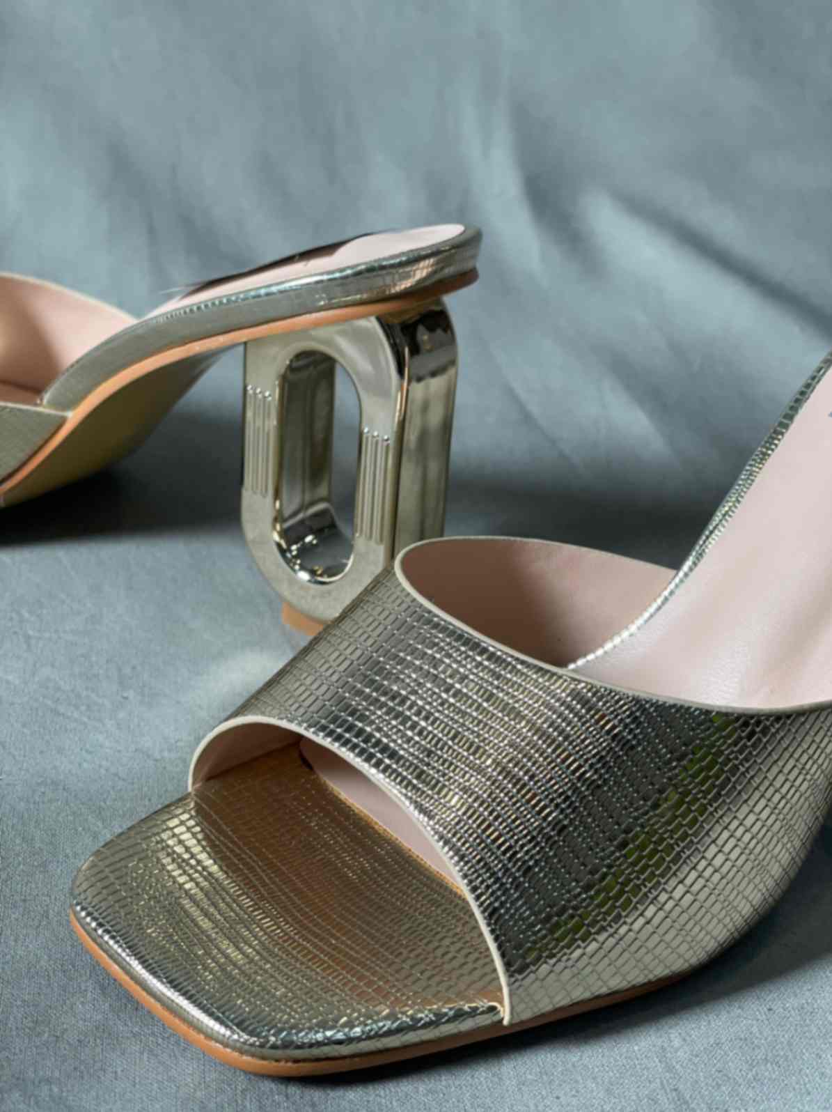 Close-up of Golden Snakeskin Pattern Heels with metallic gold shimmer and exotic snakeskin texture.