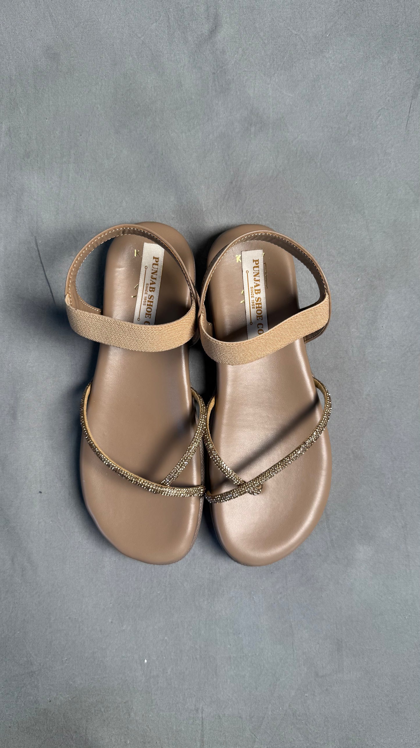 Flat thong sandals with Elastic Straps in golden colour top view