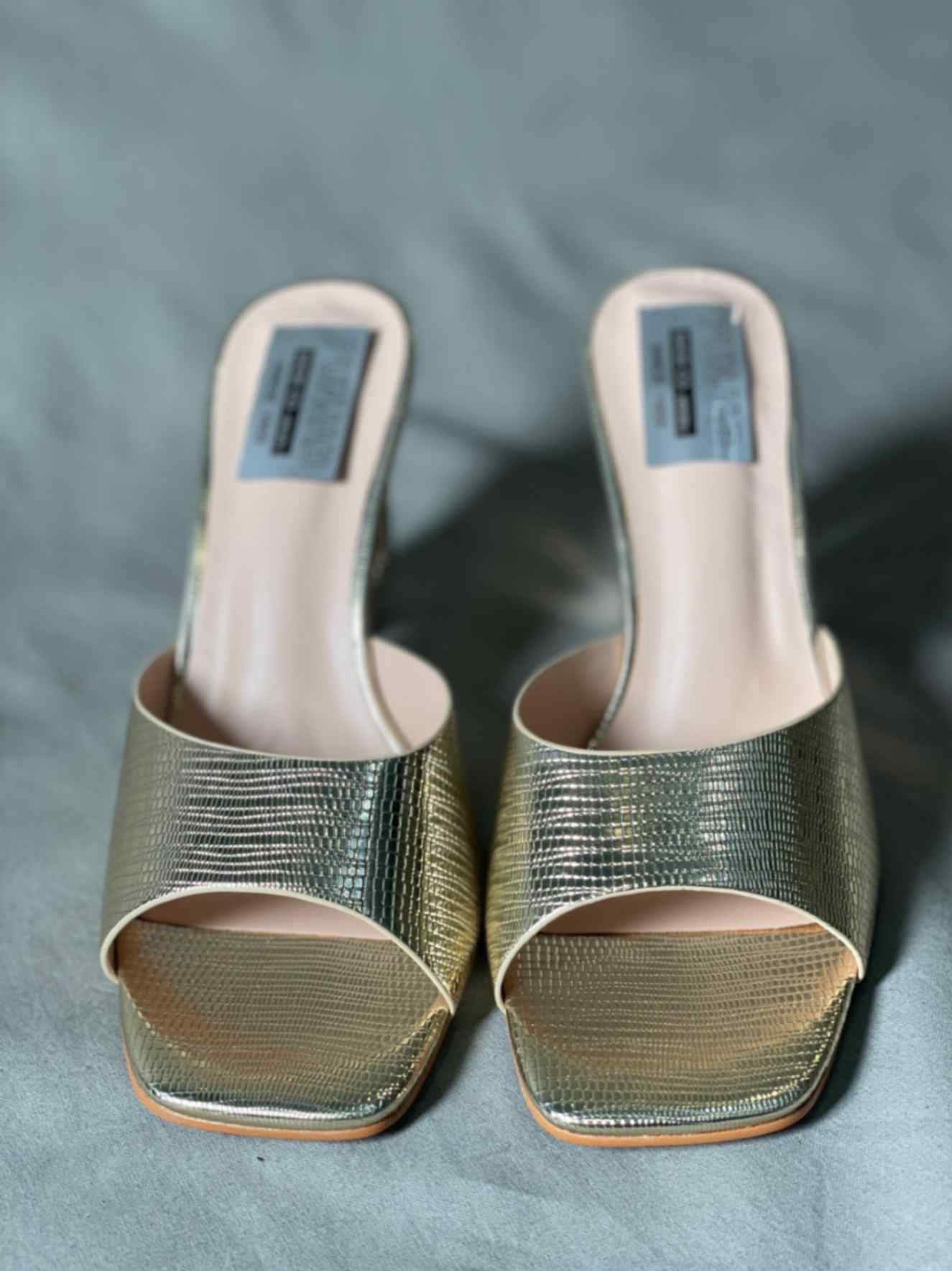 Elegant Golden Snakeskin Pattern Heels with pointed toe and block heel, perfect for formal or evening wear.