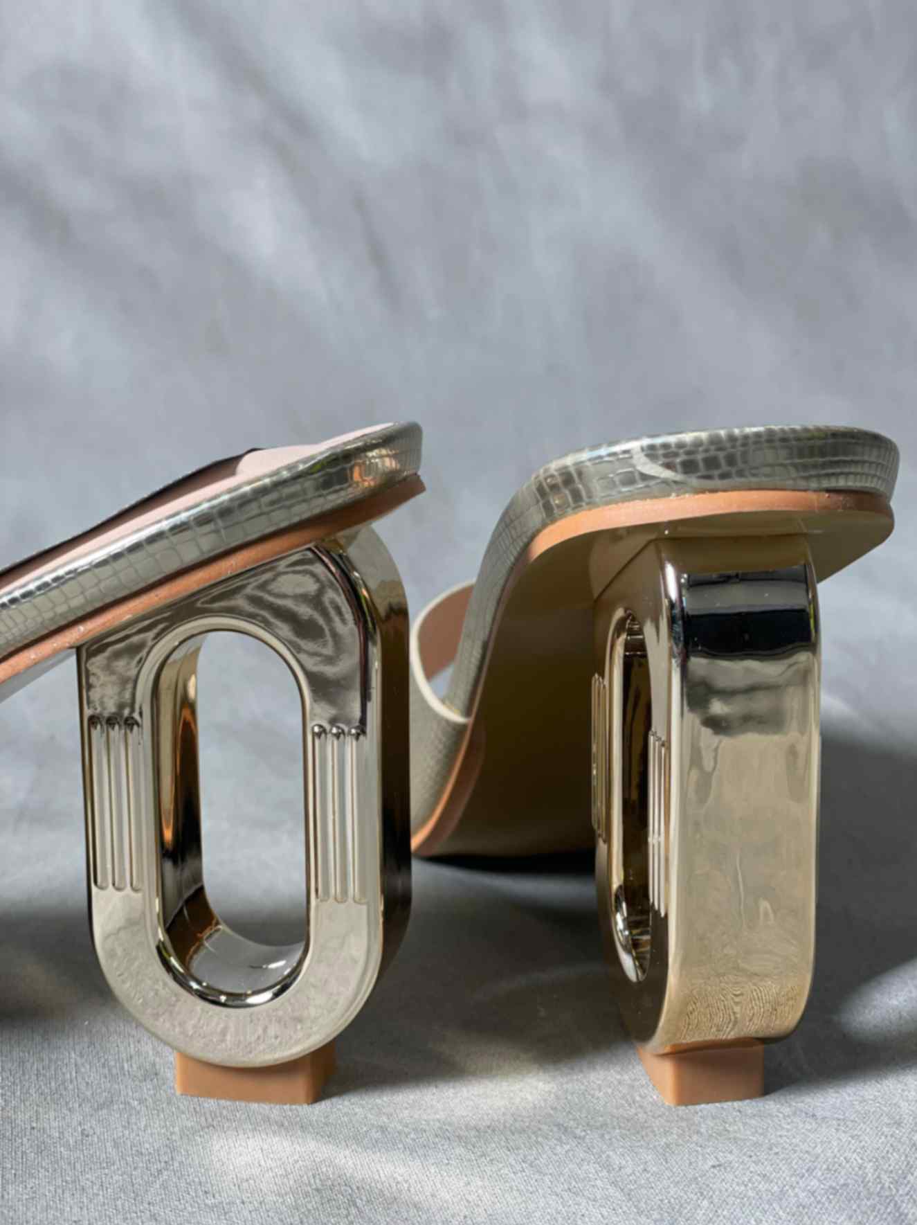 Rear view of Golden Snakeskin Pattern Heels, highlighting the sleek design and luxurious metallic gold finish.