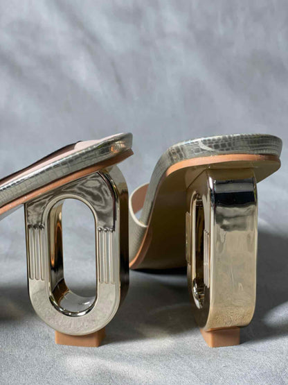 Rear view of Golden Snakeskin Pattern Heels, highlighting the sleek design and luxurious metallic gold finish.